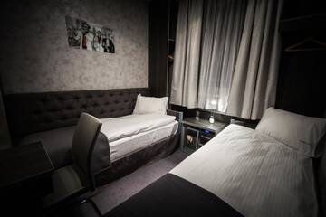 Фото номера Двухместный номер с 2 отдельными кроватями Отель Hotel Forma г. Пила 7